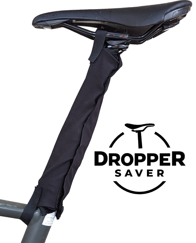 Dropper Saver installed on a dropper seat post, with Dropper Saver logo